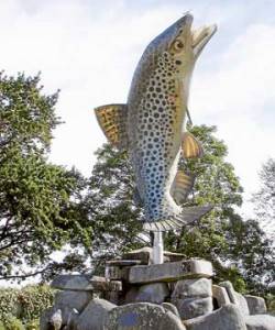 A brown trout statue